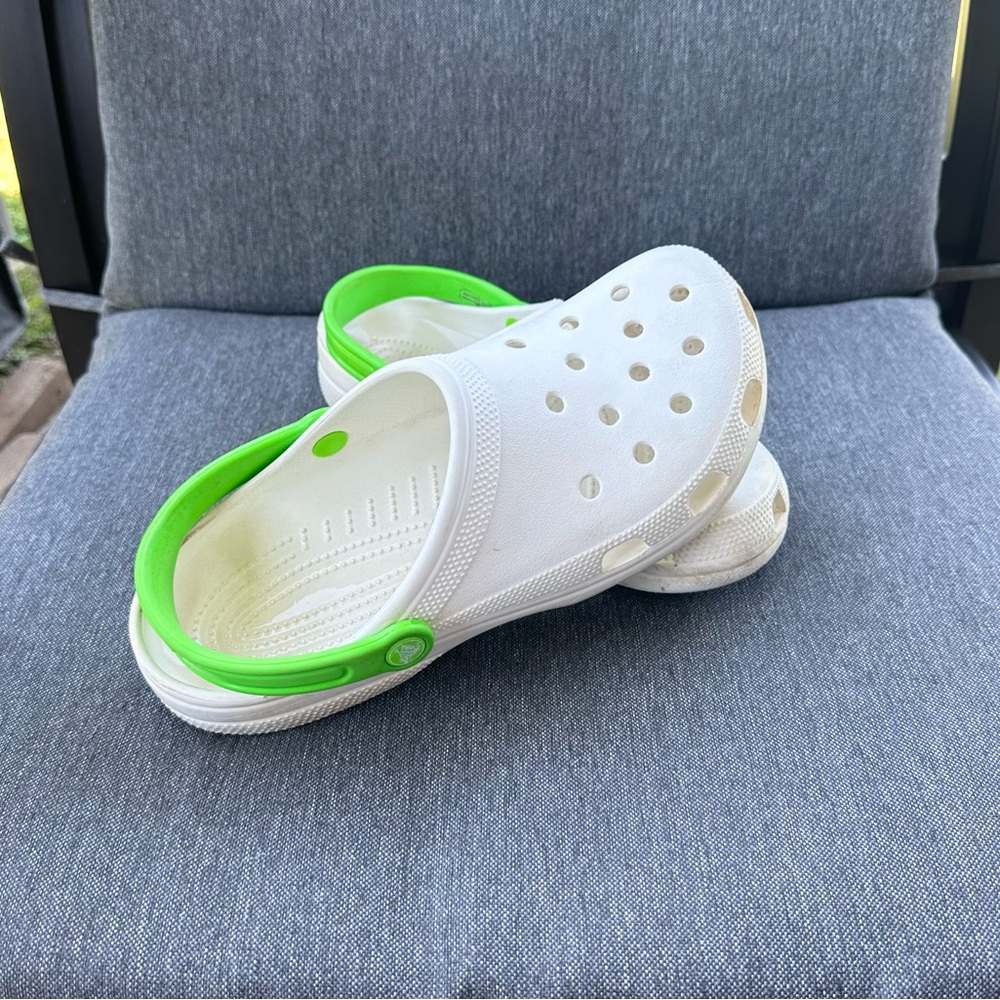 White and lime green Crocs